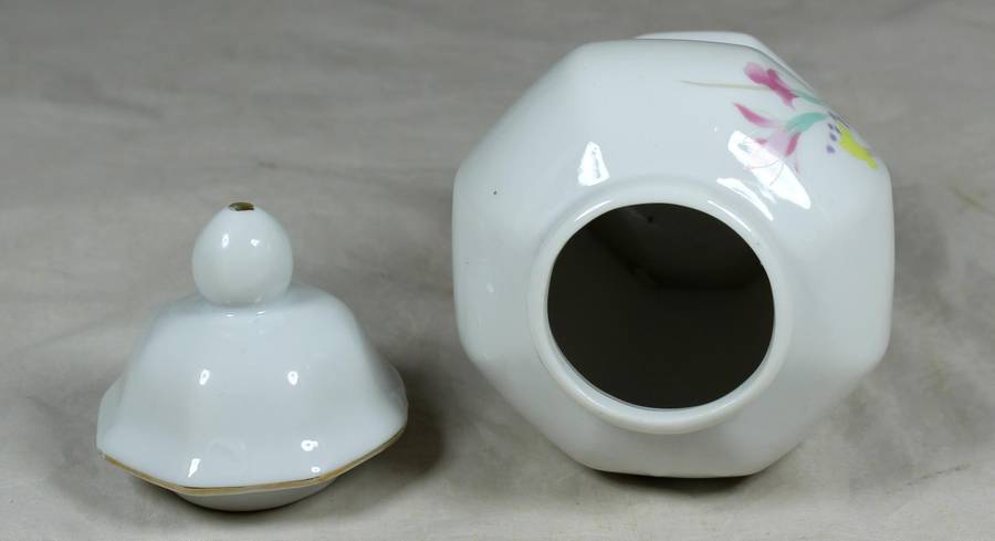Small porcelain lidded vase