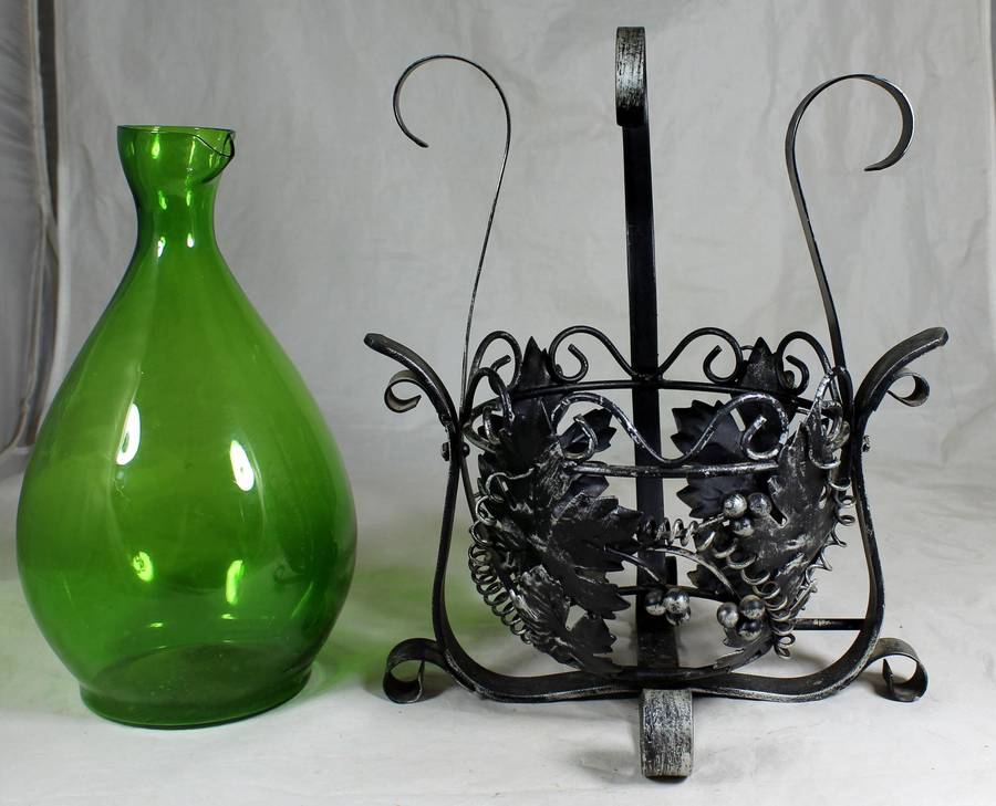 Large metal swing with green decanter