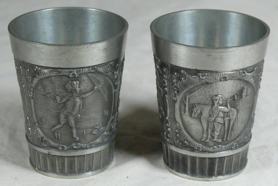 Pair of embossed pewter drinking cups