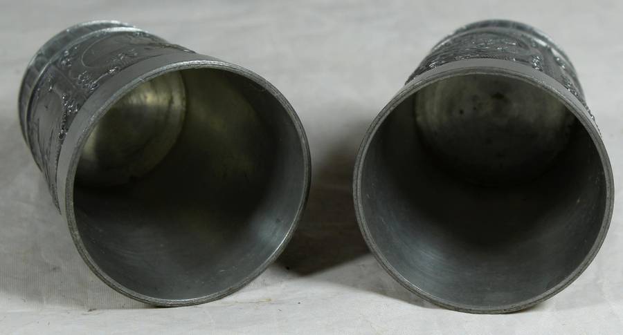 Pair of embossed pewter drinking cups