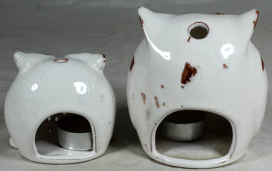 Pair of owl candle light holders