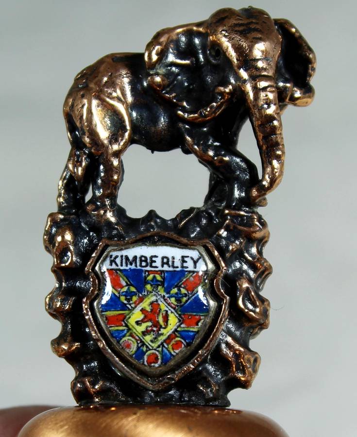 Souvenir copper bell - Kimberley with elephant topped figurine