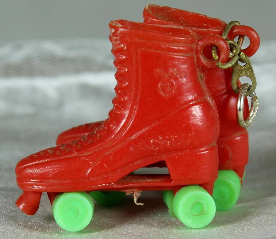 Miniature pair of plastic roller skates