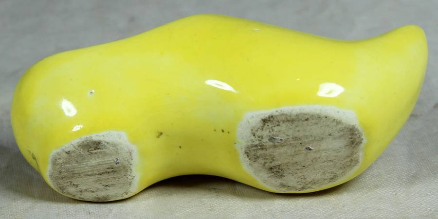 Miniature yellow ceramic Dutch shoe