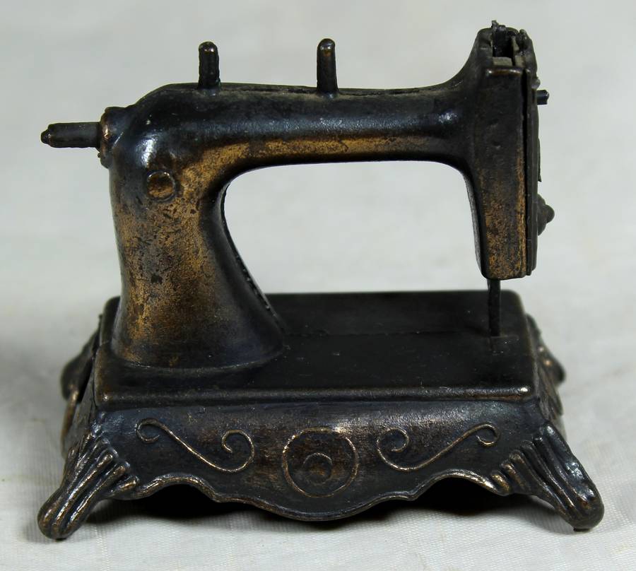 Miniature metal sewing machine pencil sharpener
