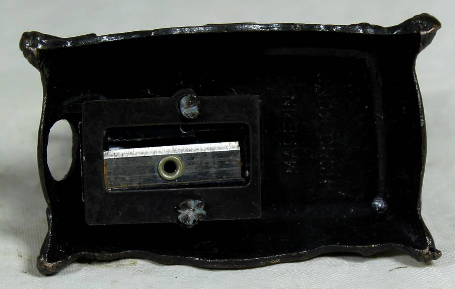 Miniature metal sewing machine pencil sharpener