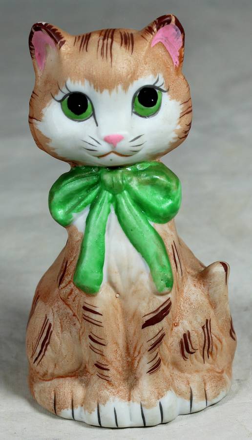 Ceramic bell Cat with green bow