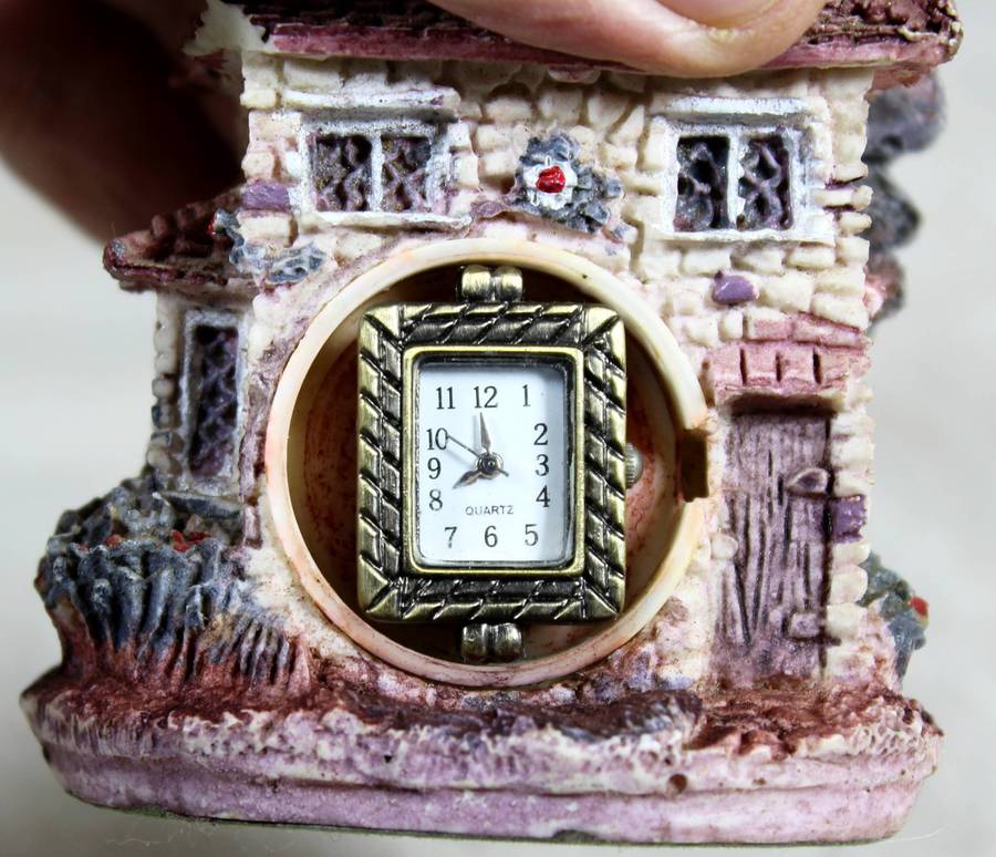 Stone house with watch