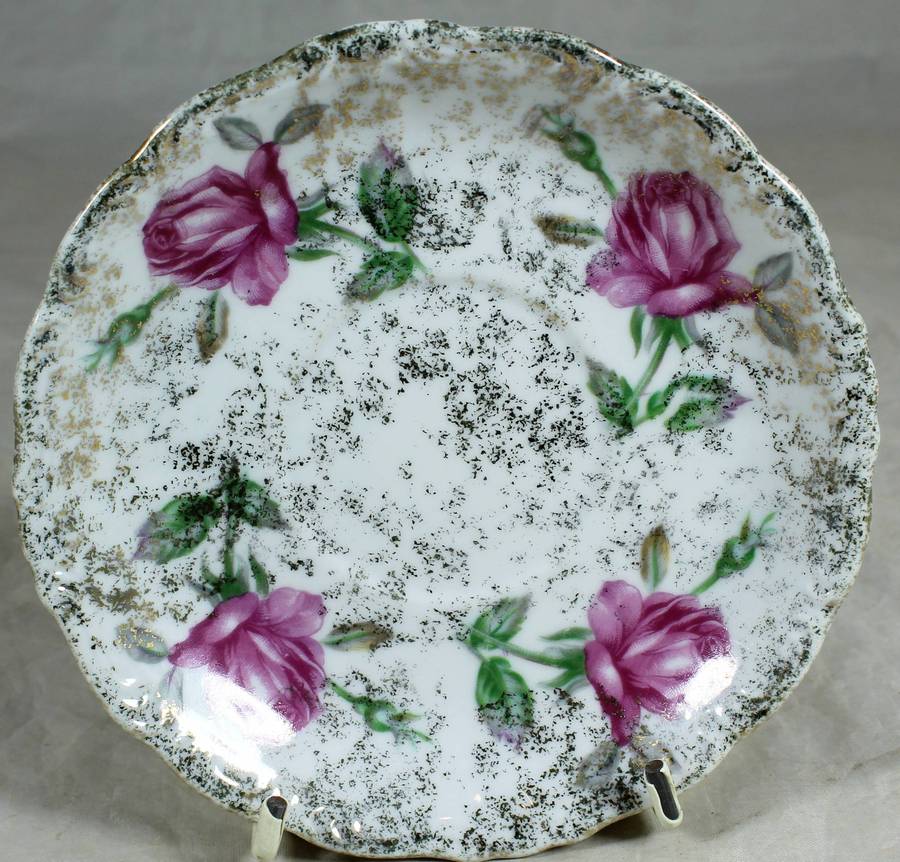 Saucer with purple roses