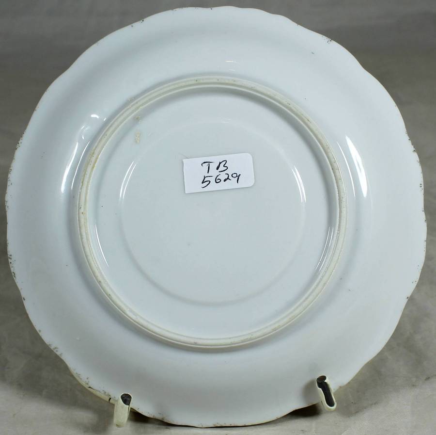 Saucer with purple roses