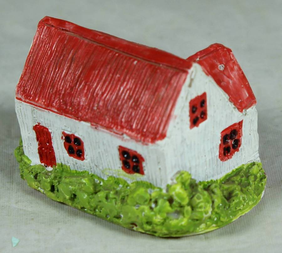 Miniature house with a porch