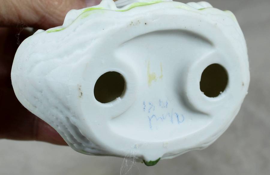 Ceramic country girl holding a parasol