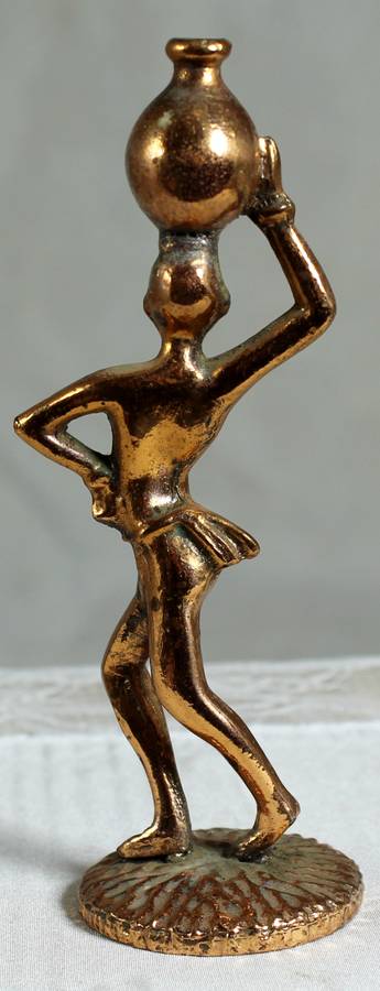 Miniature lady carrying a pot - copper - lead filled
