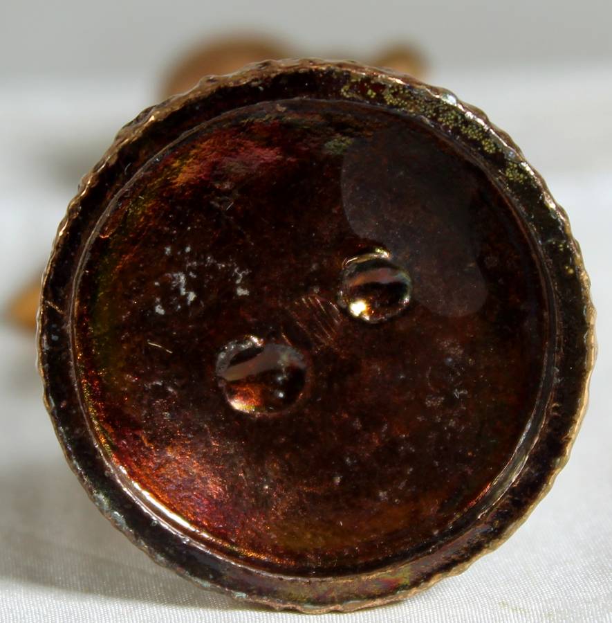 Miniature lady carrying a pot - copper - lead filled