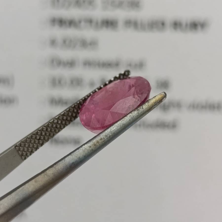 Fracture filled Ruby slight violet red Oval mixed cut 4.02 carat with Gemlab certificate