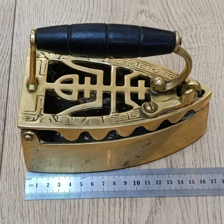 Antique brass sad iron