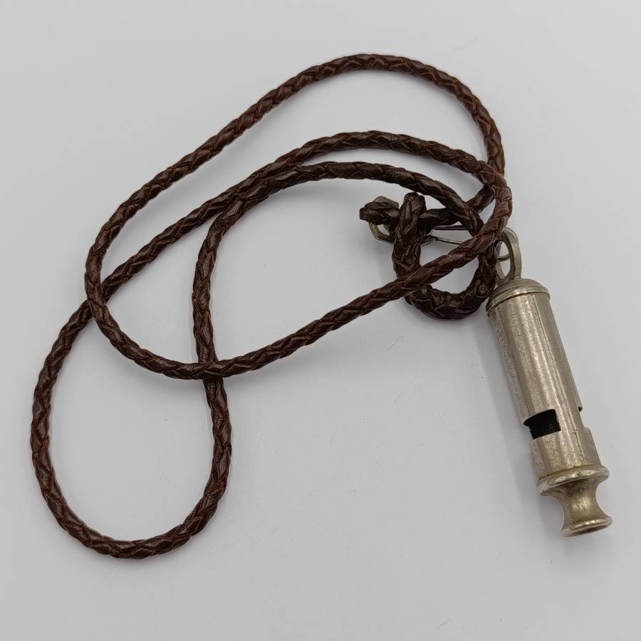 The ACME city police whistle with leather lanyard