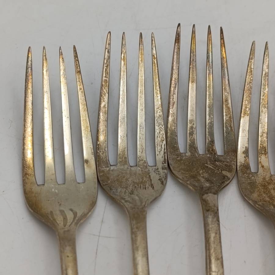 Vintage set of 12 Pak-Alam silverplated forks