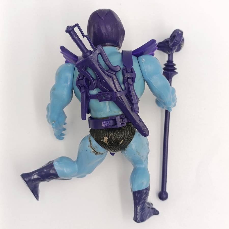 Vintage Masters of the Universe Skeletor figurine with weapons and accessories