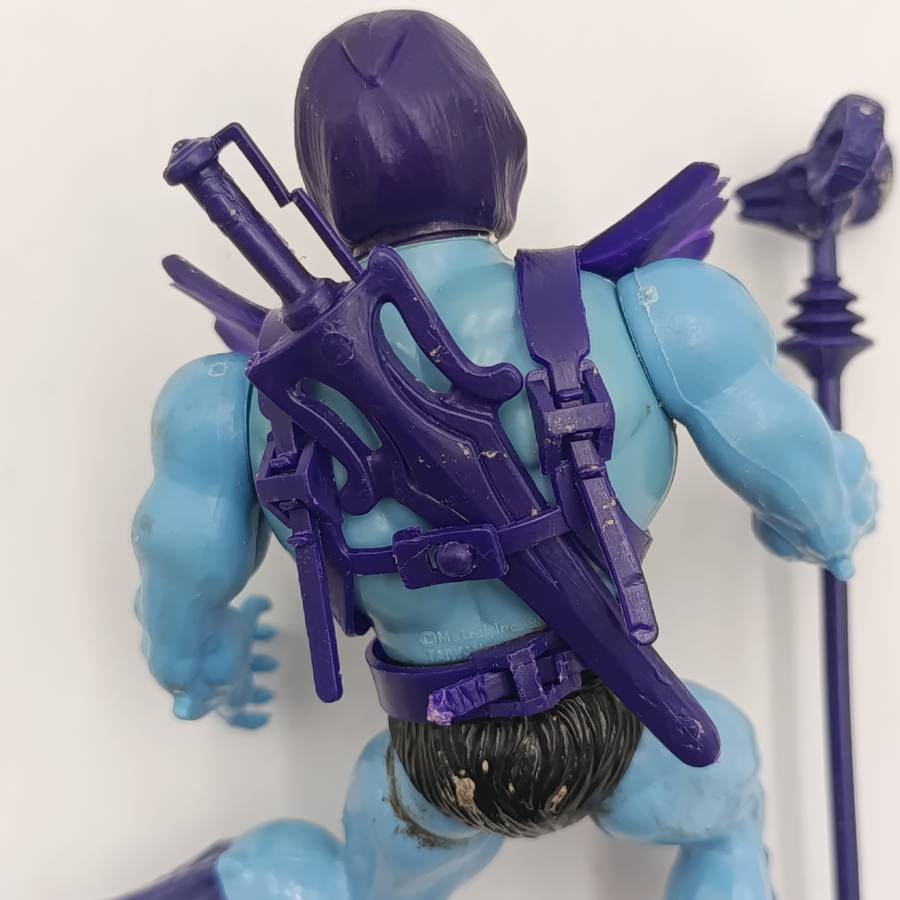 Vintage Masters of the Universe Skeletor figurine with weapons and accessories