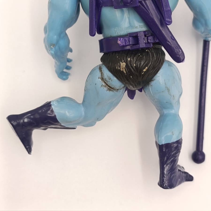 Vintage Masters of the Universe Skeletor figurine with weapons and accessories