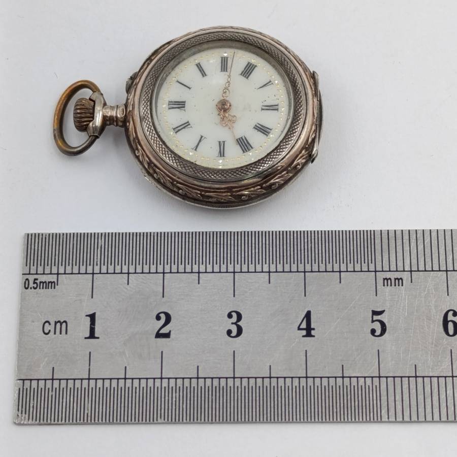 Antique 800 Silver ladies pocketwatch with gold decoration - runs and stops
