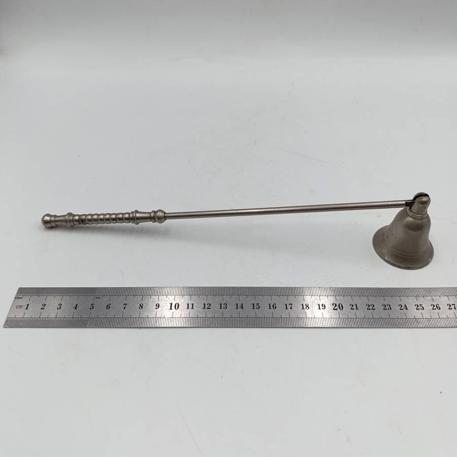 Vintage white brass candle snuffer