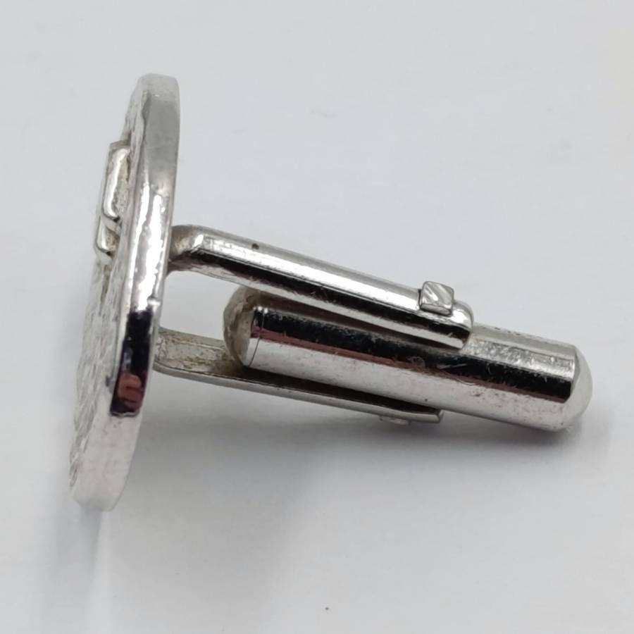 Pair of Suzuki cufflinks
