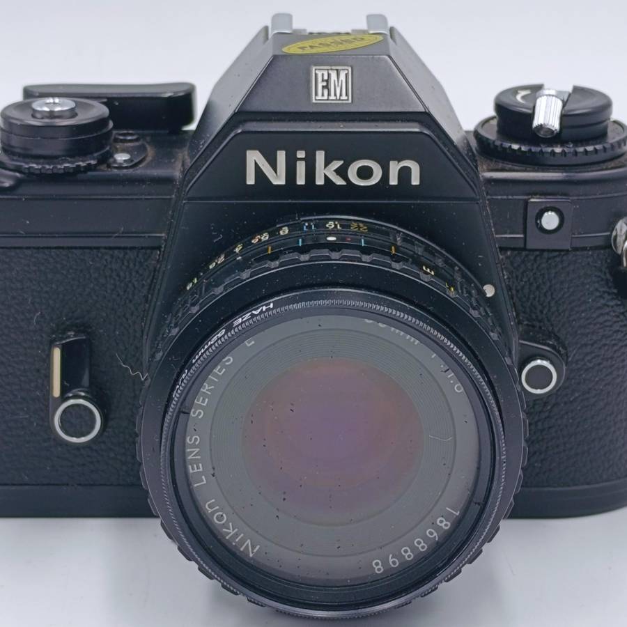 Vintage Nikon M90 35mm film camera with Nikon Series E 1:1.8 50mm lens - shutter firing