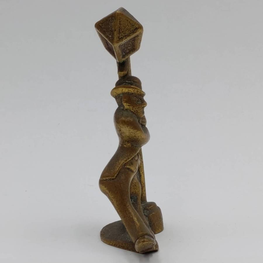 Vintage drunk man leaning on lamp post figurine
