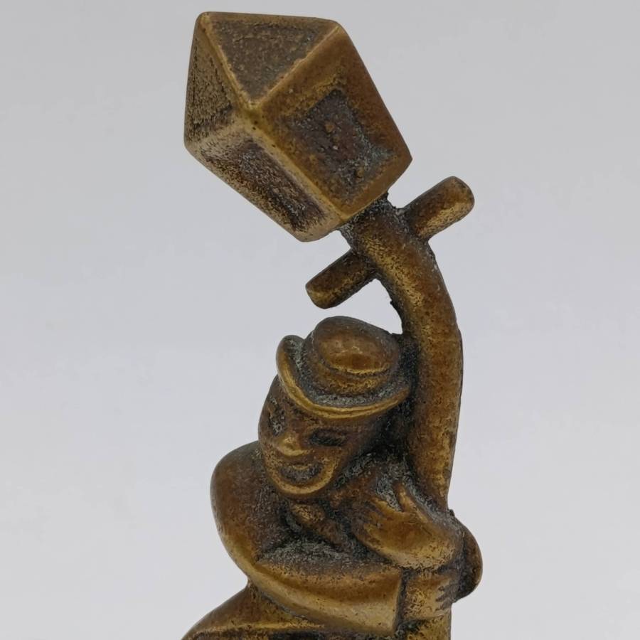 Vintage drunk man leaning on lamp post figurine