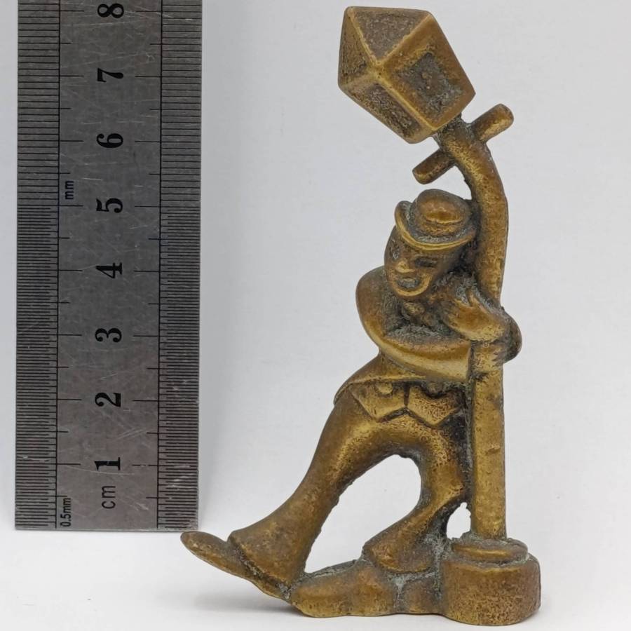 Vintage drunk man leaning on lamp post figurine