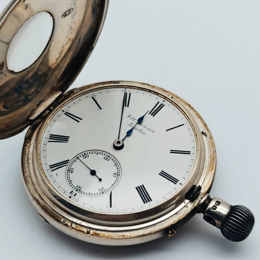 Antique hallmarked silver 1892 half hunter pocketwatch in silver front travelling case - working