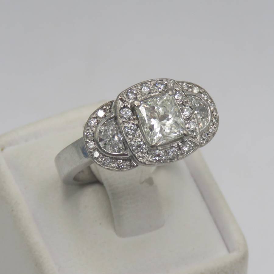 Bespoke 9kt white gold diamond ring with 1,09ct Princess cut diamond with 2 x colour D/E half moon