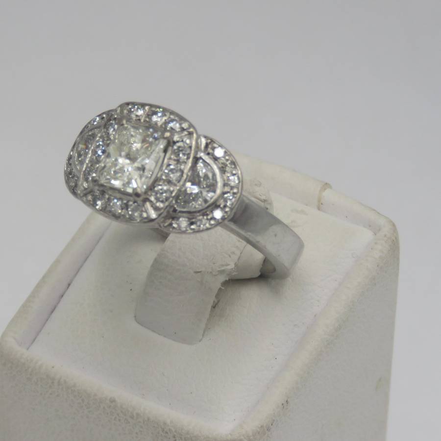 Bespoke 9kt white gold diamond ring with 1,09ct Princess cut diamond with 2 x colour D/E half moon