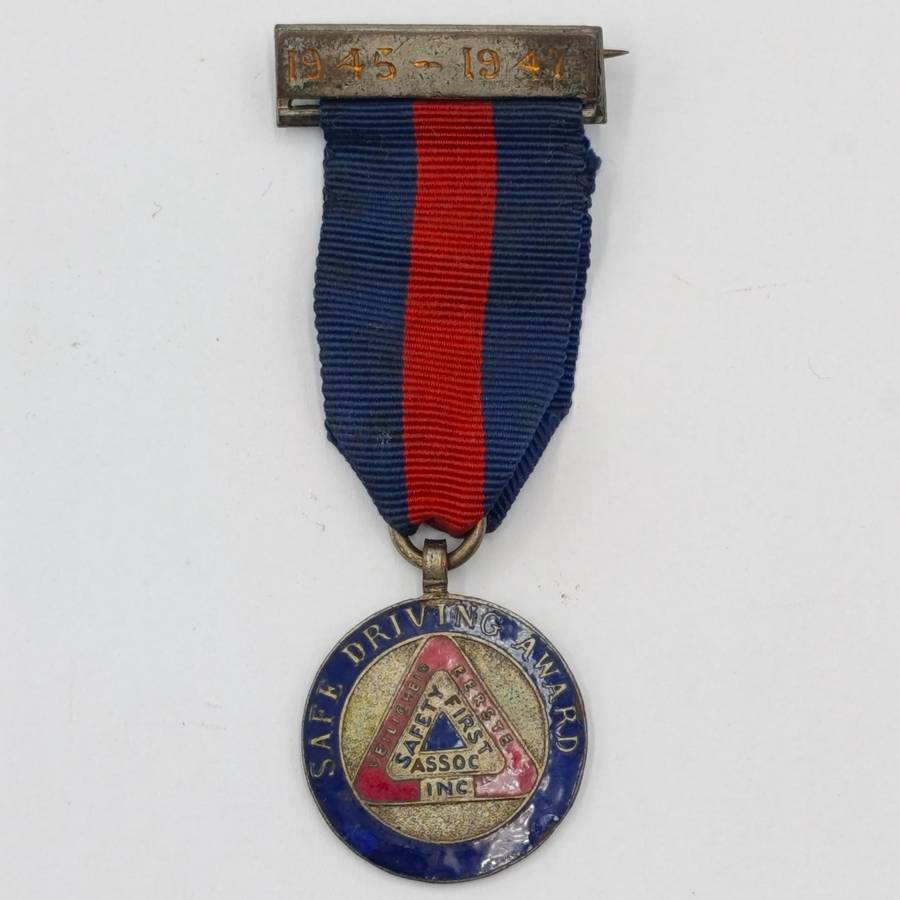 1945-1947 Safe Driving Award medal issued to TD 1150 J. Lutley