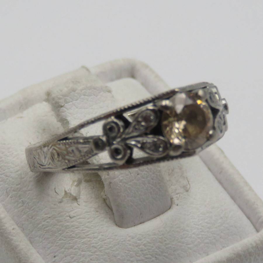 Bespoke 9kt White gold ring with Champagne citrine with 12 small diamonds in design - weighs 5,4g