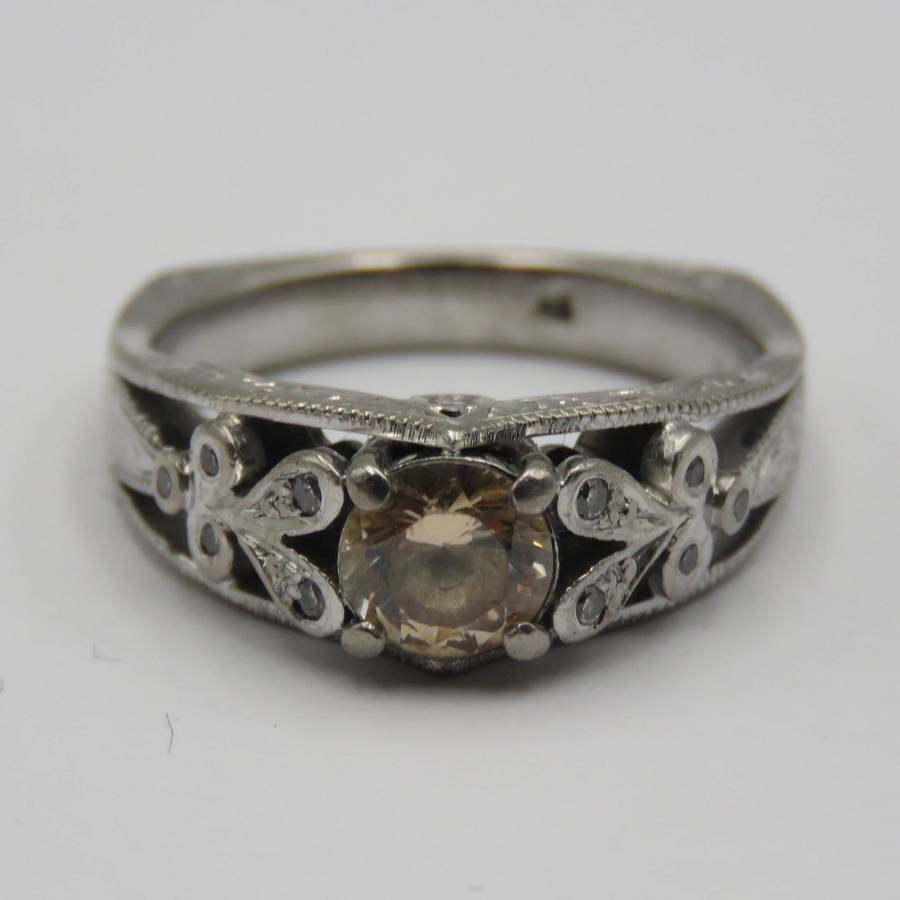 Bespoke 9kt White gold ring with Champagne citrine with 12 small diamonds in design - weighs 5,4g