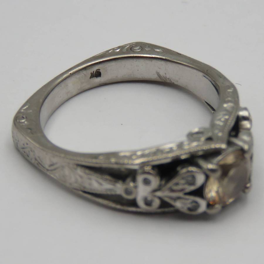 Bespoke 9kt White gold ring with Champagne citrine with 12 small diamonds in design - weighs 5,4g