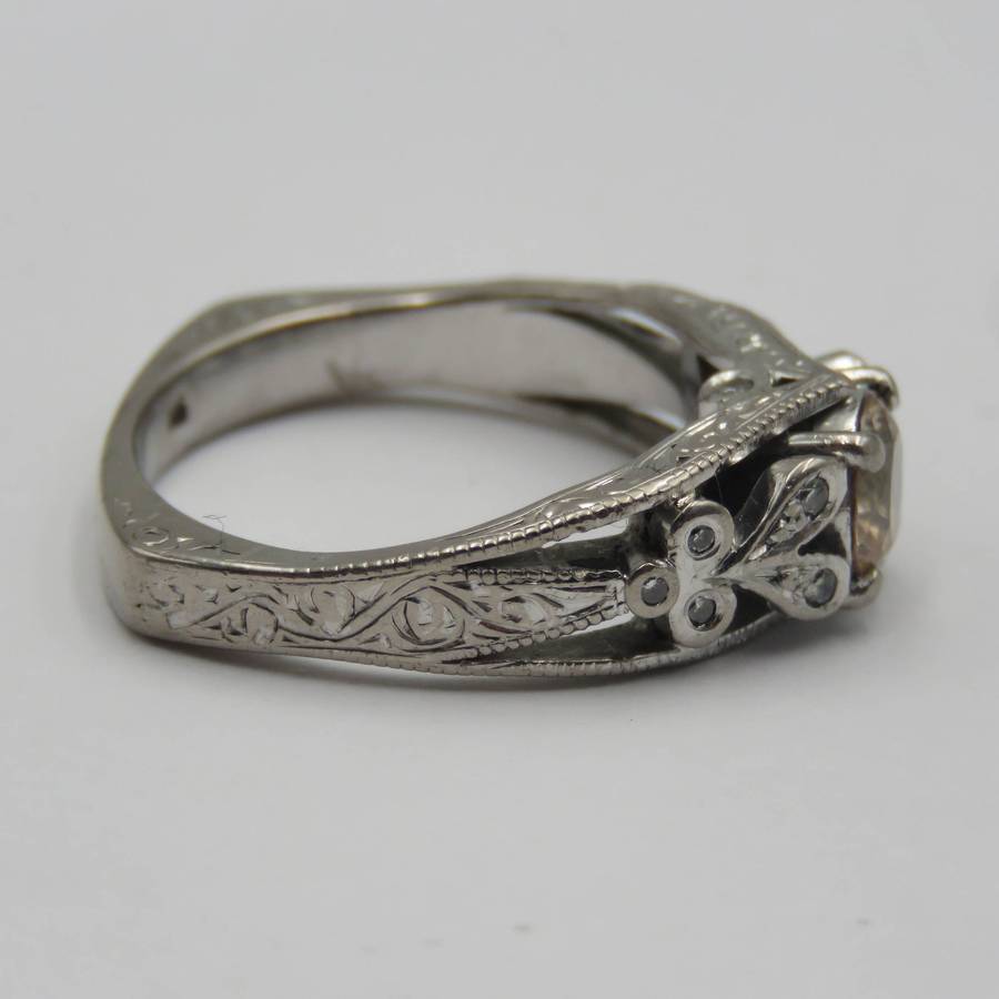 Bespoke 9kt White gold ring with Champagne citrine with 12 small diamonds in design - weighs 5,4g