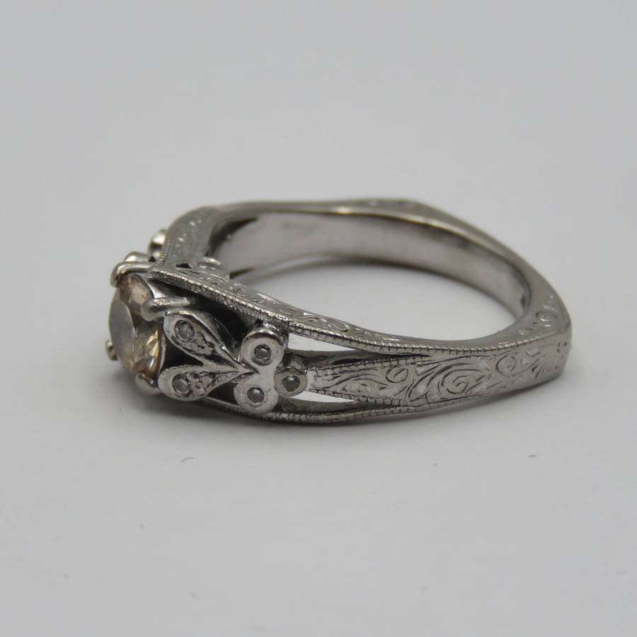 Bespoke 9kt White gold ring with Champagne citrine with 12 small diamonds in design - weighs 5,4g