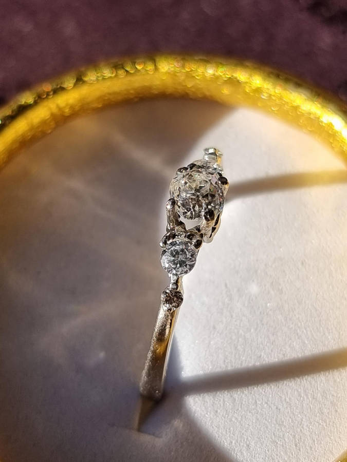 "0.70 CARAT NATURAL DIAMOND" ENGAGEMENY RING Set in 9CT White Gold. ( Genuine Gold.)