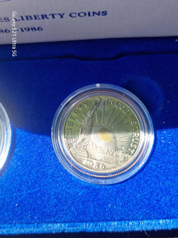 Statue of Liberty Silver Dollor & Clad Hald Coins
