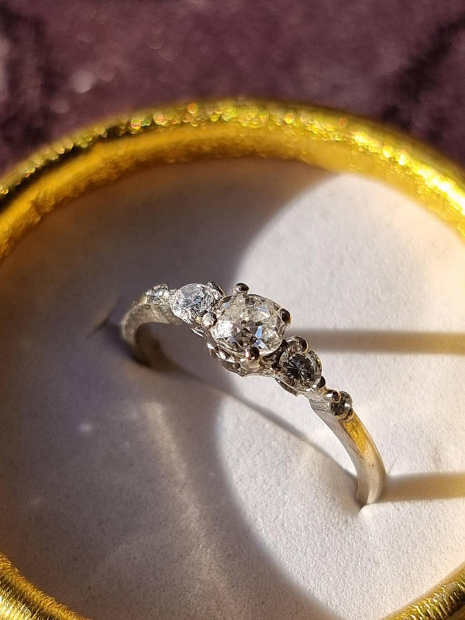 "0.70 CARAT NATURAL DIAMOND" ENGAGEMENY RING Set in 9CT White Gold. ( Genuine Gold.)