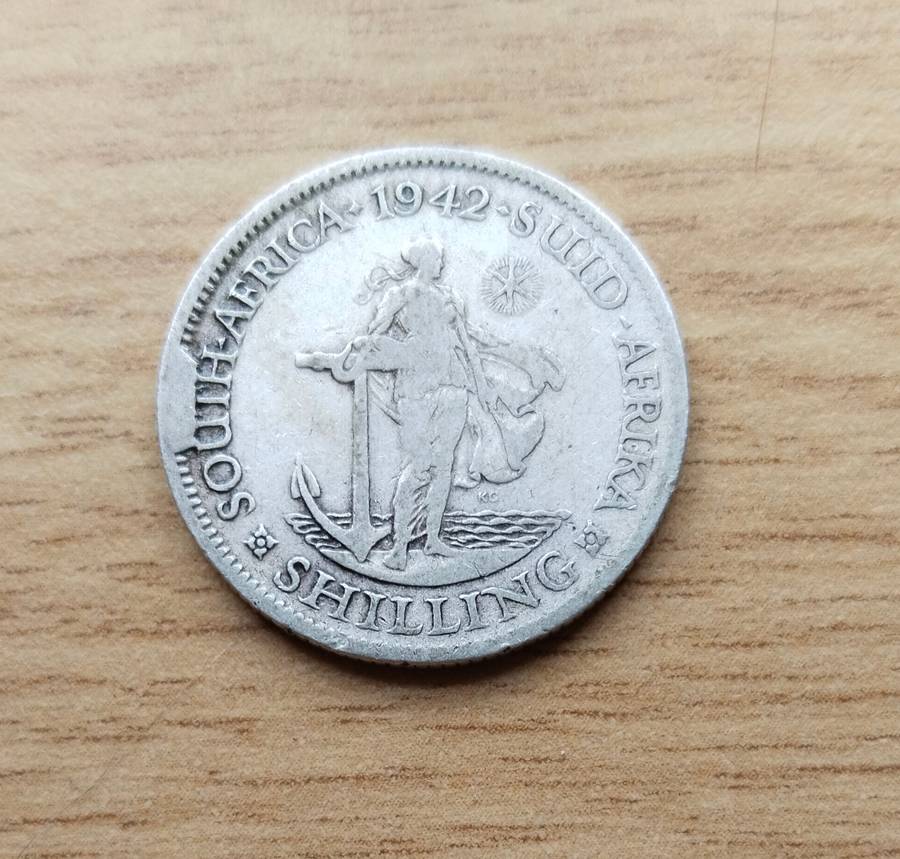 Error 1942 Silver South Africa Shilling.