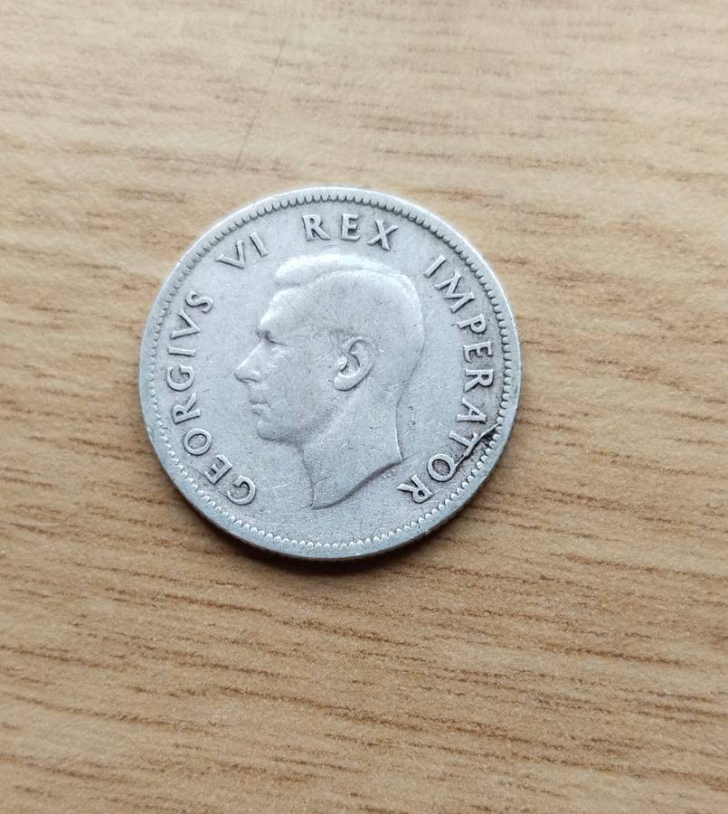 Error 1942 Silver South Africa Shilling.