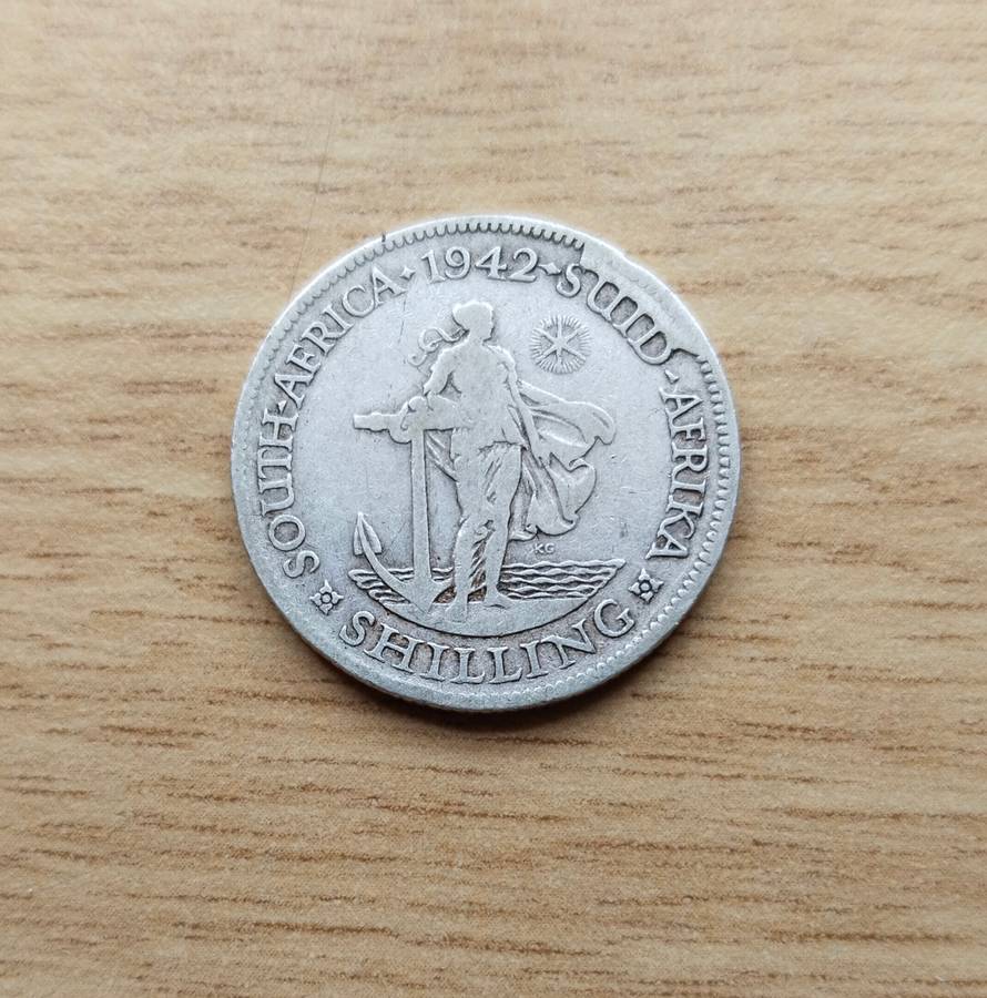 Error 1942 Silver South Africa Shilling.