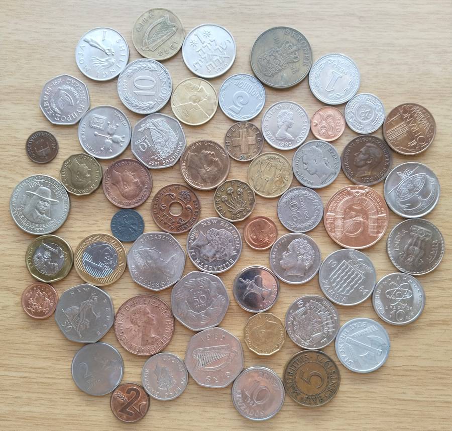 Large collection of old coins from around the world. Some good.