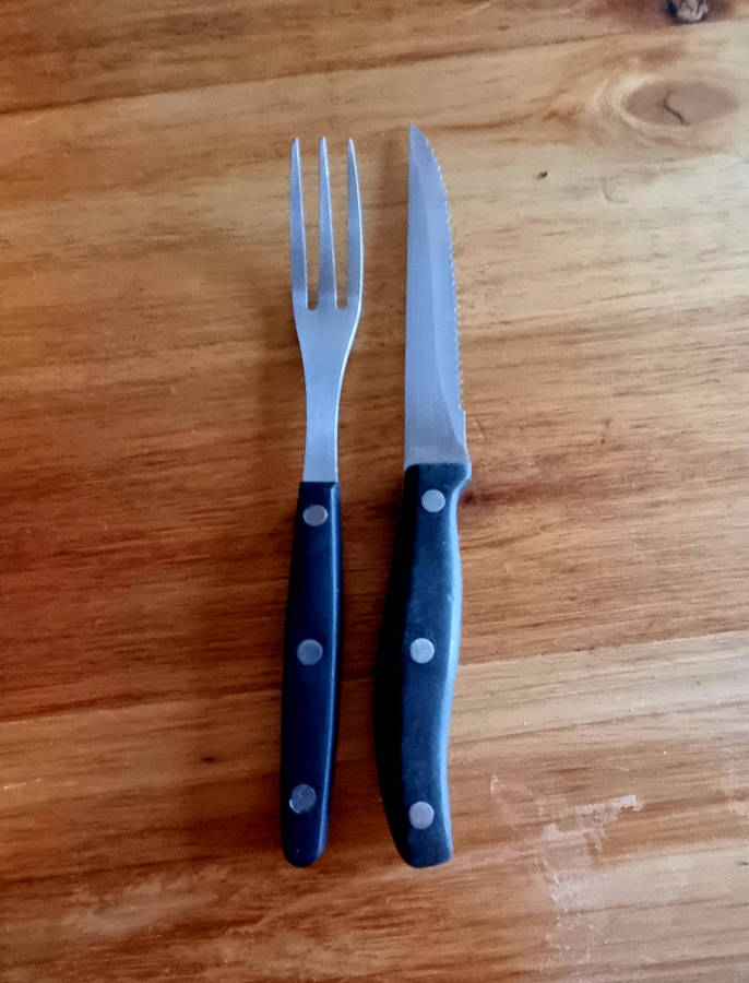 12 steak knives and forks