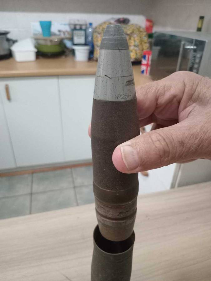 Artillery shell casing with head projectile (empty, used)